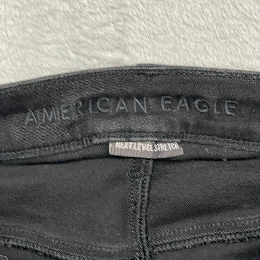 American Eagle Super Hi-Rise Jegging Womens 4 Black Distressed Ripped Next Level